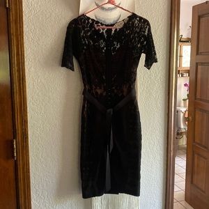 Beautiful lace knee length black dress, ‘beguile’ by Byron Lars